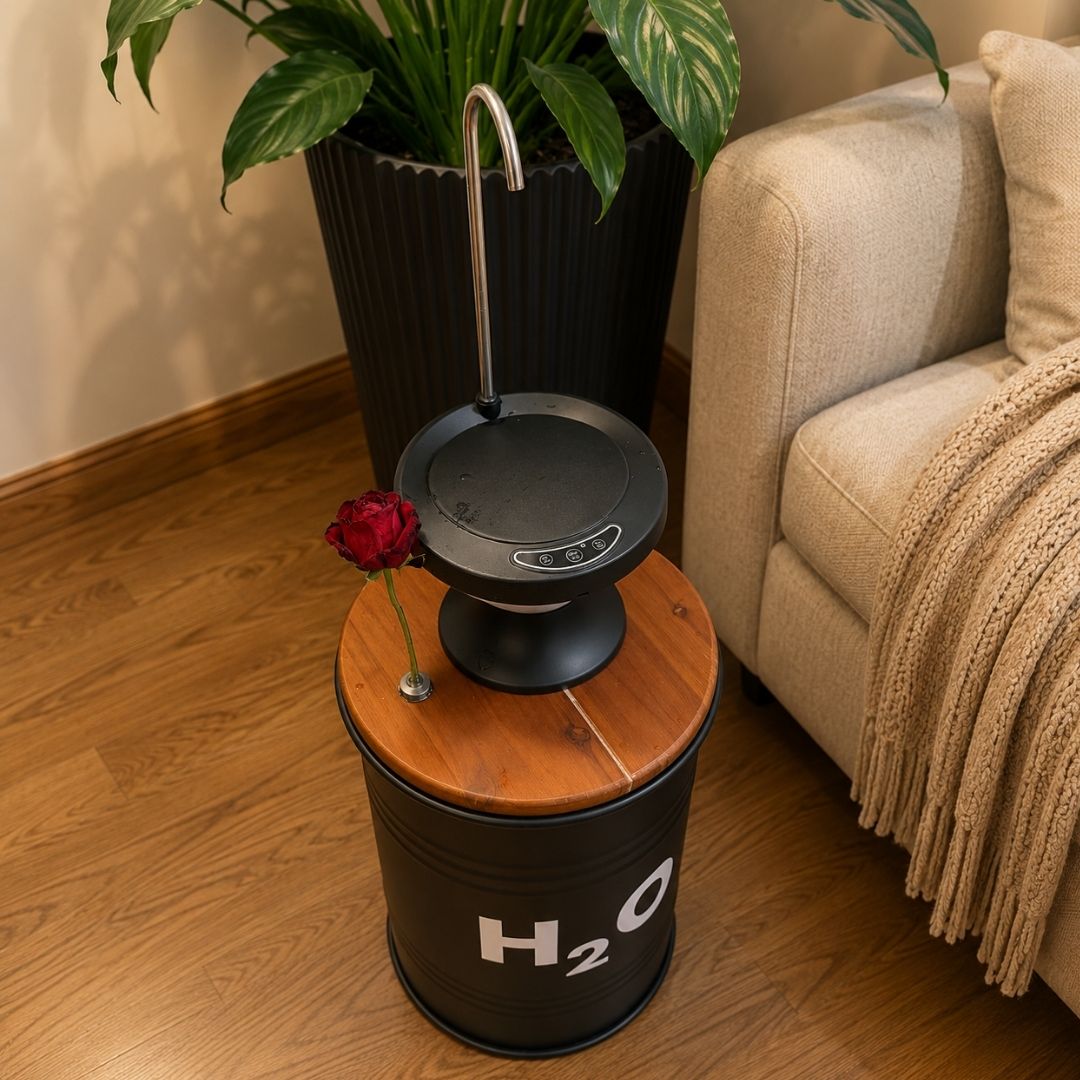 5-Gallon Hidden Water Jug Side Table with Wireless Dispenser Pump & Floral Tube – Black Metal H₂O Barrel